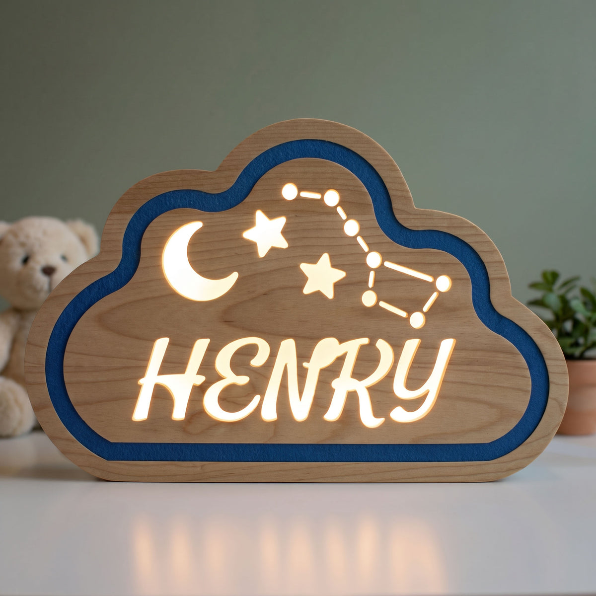 Cloud night light, Henry, lit, front view in daylight