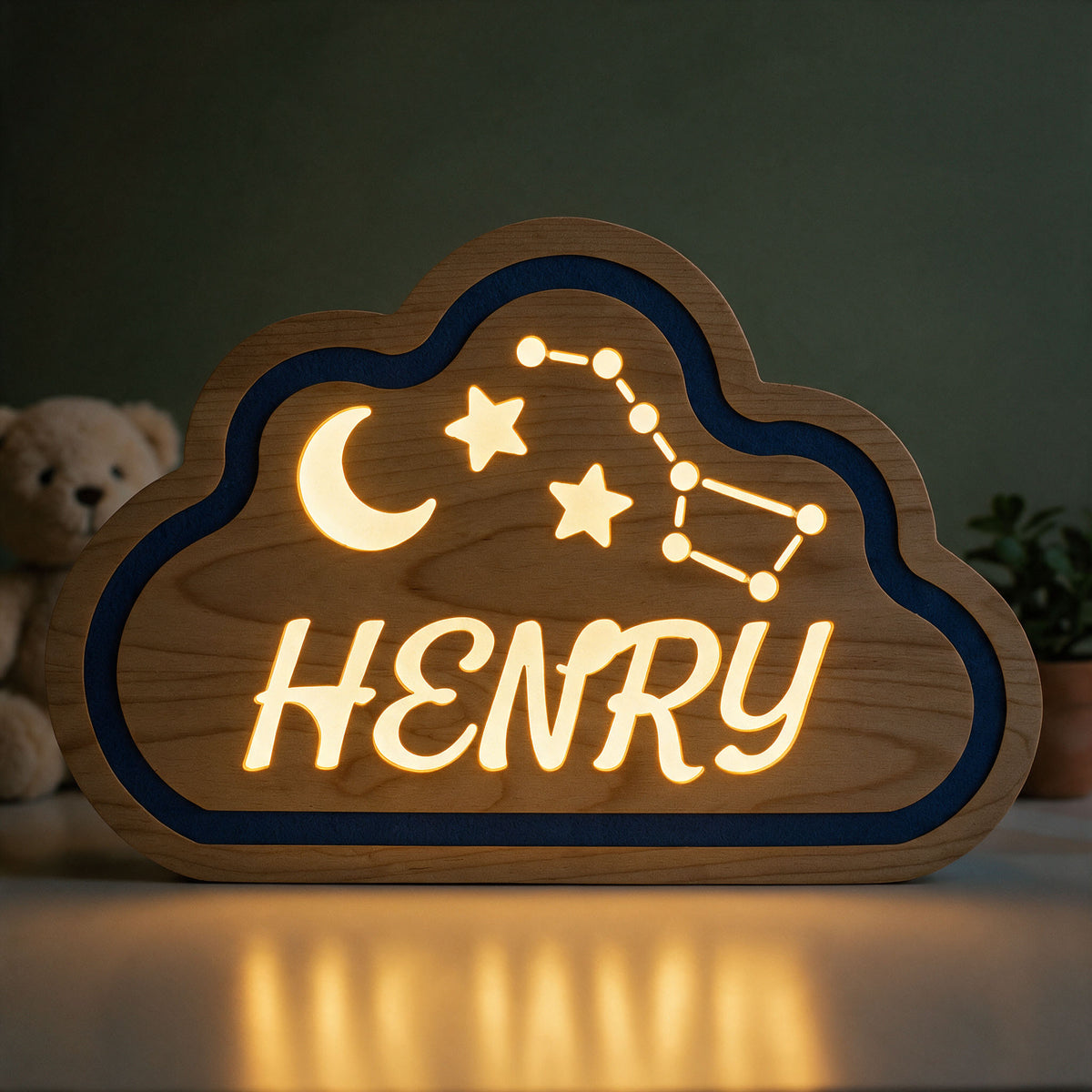 Cloud night light, Henry, lit in the evening, in a child's bedroom