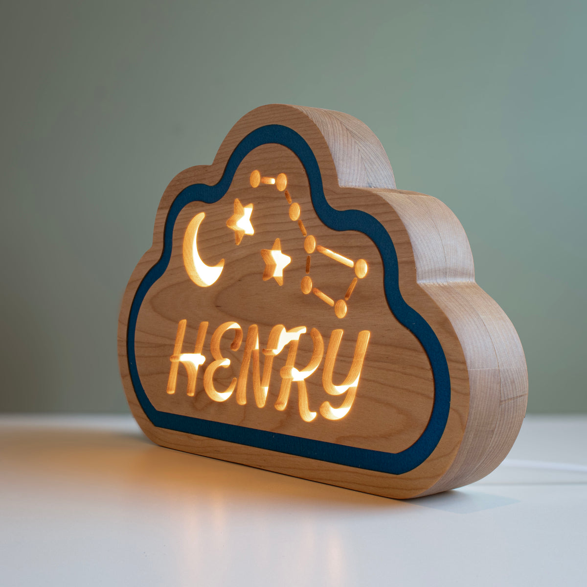 Cloud night light, Henry, three-quarter view showing solid wood thickness