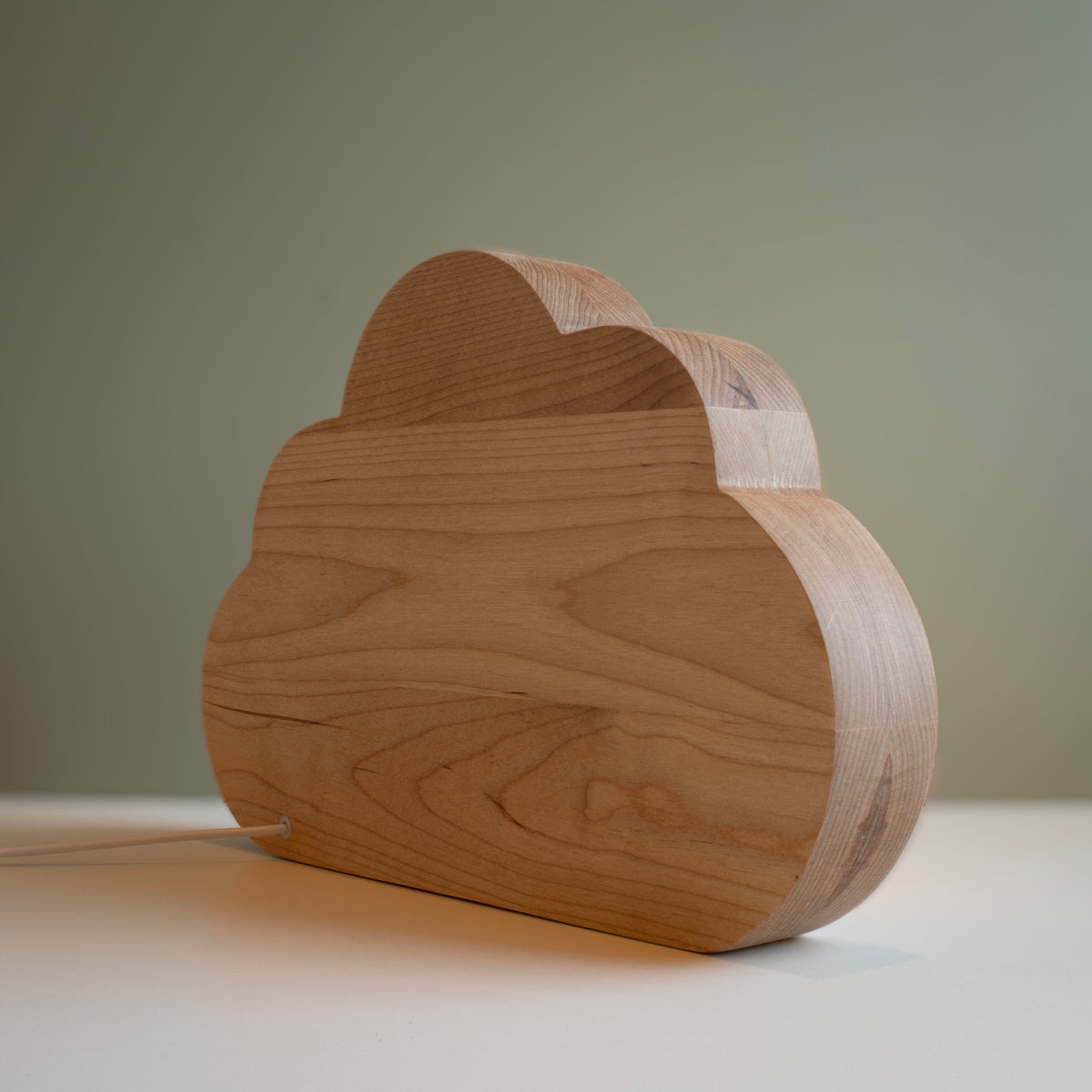Cloud night light, back view, finished solid wood, power cable